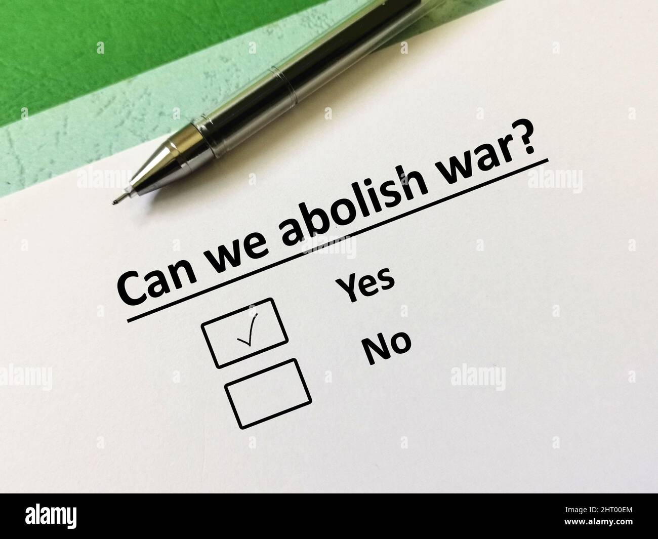 One person is answering question about conflict and war. The person thinks that we can abolish war. Stock Photo