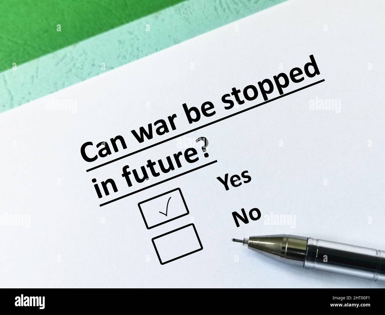 One person is answering question about conflict and war. The person thinks that war can be stopped in future. Stock Photo