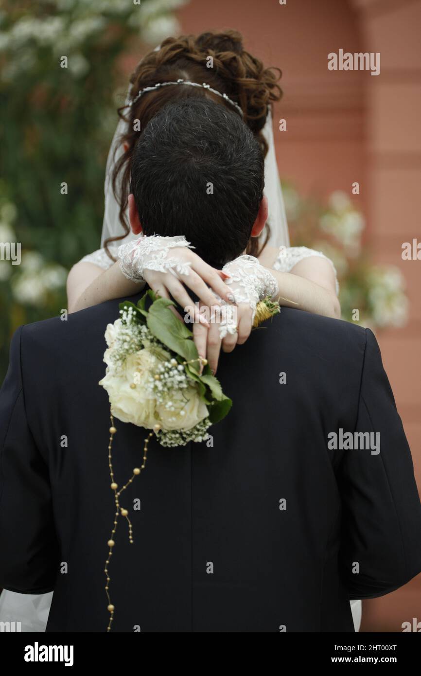 Bride groom holding hands hugging hi-res stock photography and images ...