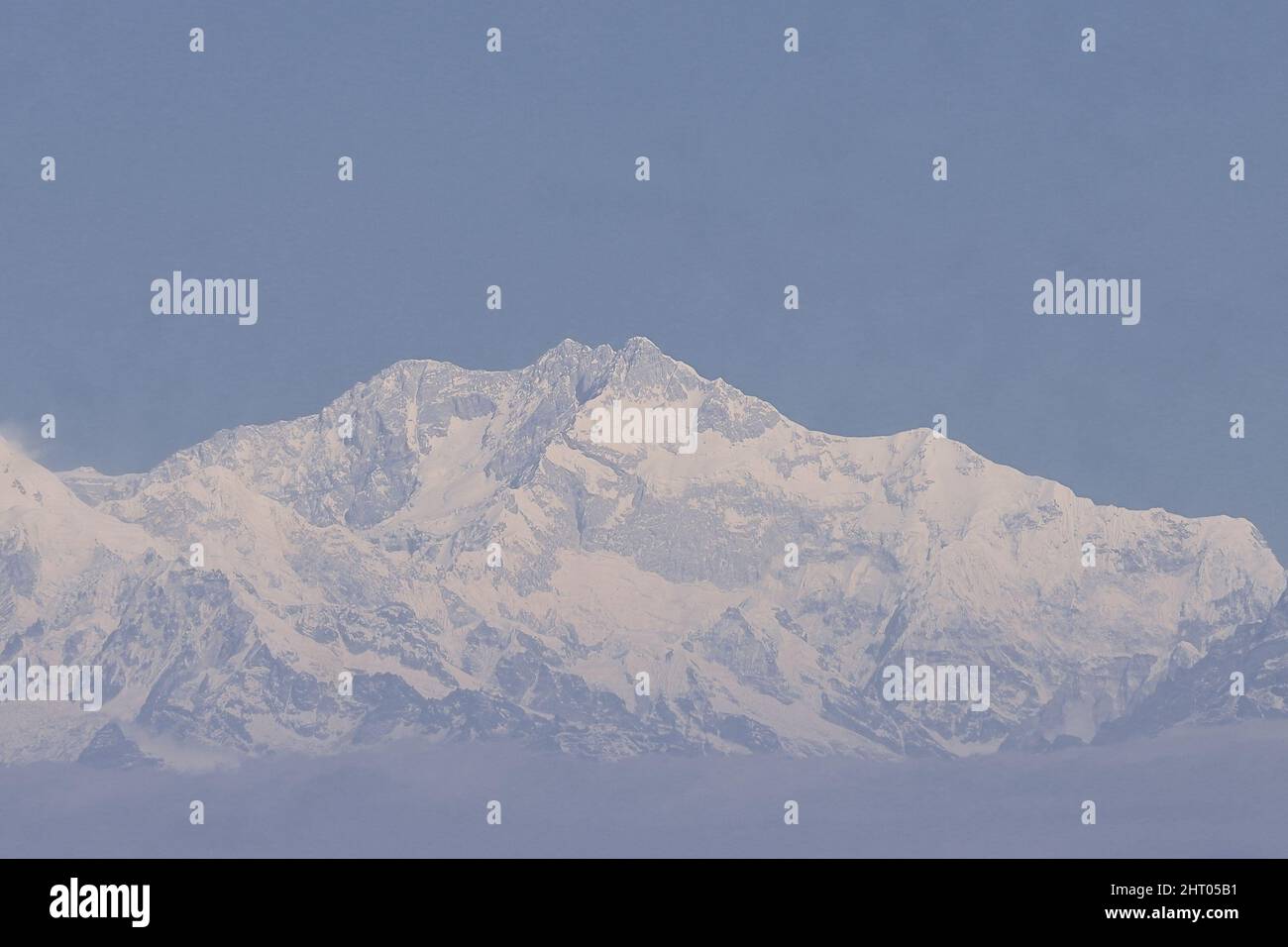 world 3rd highest peak mount kangchenjunga or kanchenjunga and snowcapped himalaya from lepcha jagat near darjeeling, west bengal, india Stock Photo