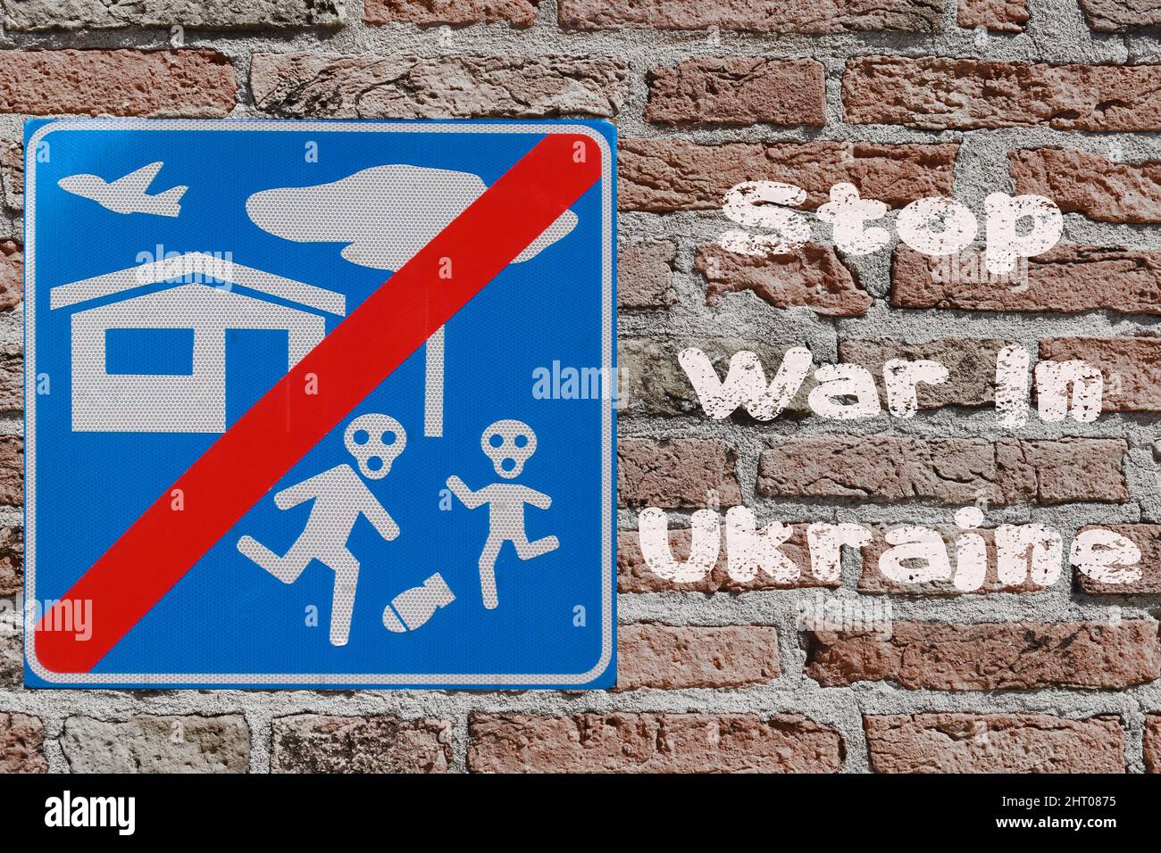 Stop War in Ukraine written on a brick wall with no bombing sign. Third ...