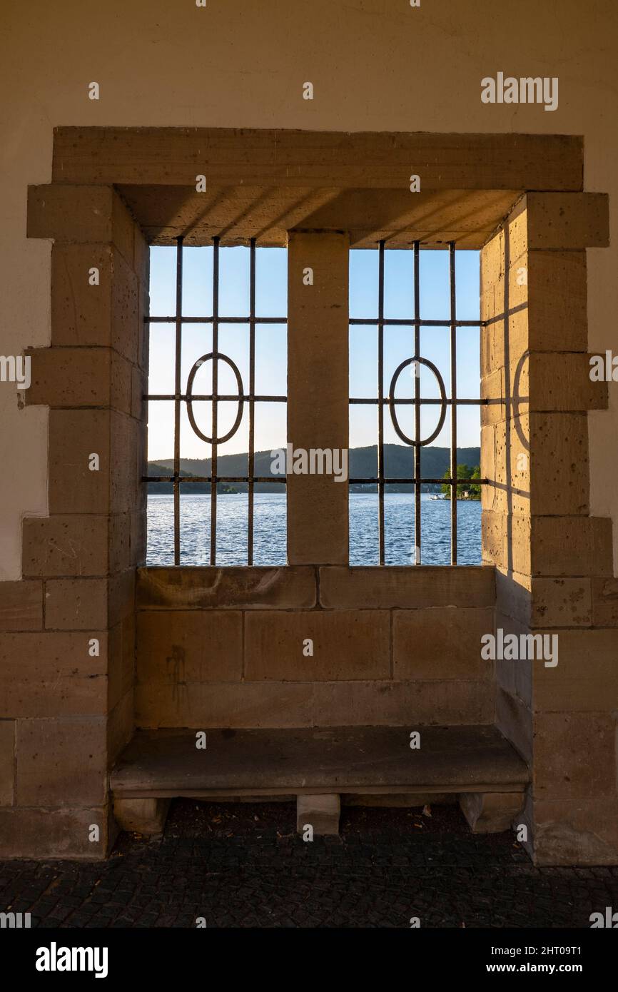 Edersee retaining wall in Germany. Taken through the outside window of the dam building on the reservoir. Stock Photo