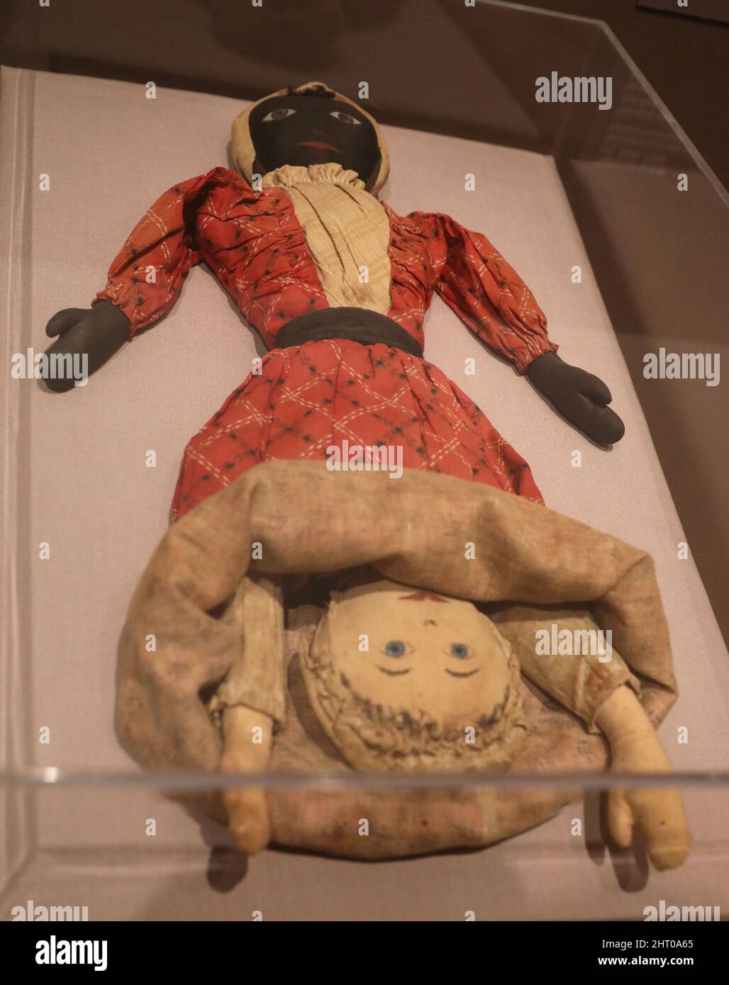 New York, New York, USA. 25th Feb, 2022. A view of a TOPSEY-TURVY doll, ca. 1890-1905 seen on display at the New York Historical Society's new exhibition of ''˜Black Dolls' which explores race, gender and history through doll making. The doll is white when seen one way, and then black when you flip it around. (Credit Image: © Nancy Kaszerman/ZUMA Press Wire) Stock Photo