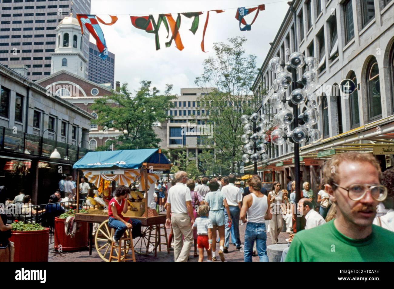A 1980 view down Market Street of a busy Quincy Market in Boston