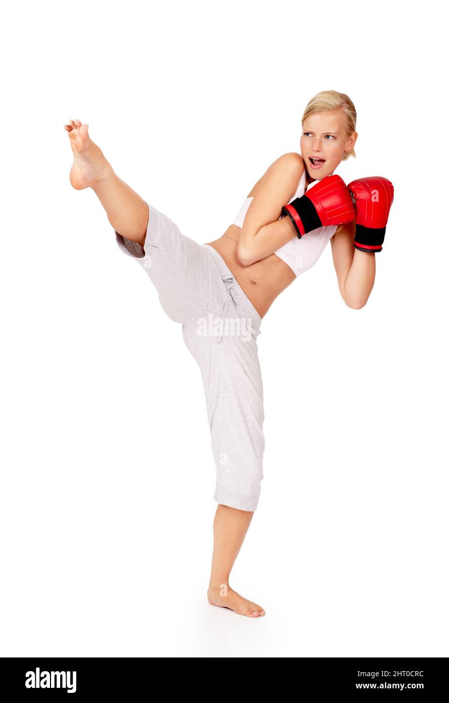 Its not about being down, its about getting back up. Shot of a beautiful female boxer. Stock Photo