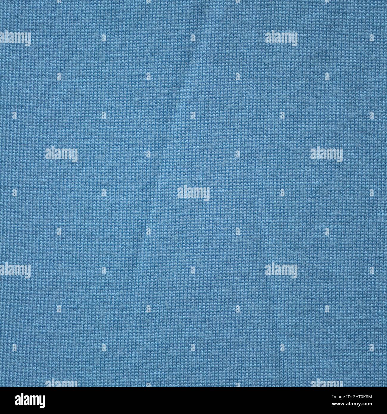 Knitted blue  texture surface close up. Background from softness blue  blanket. Stock Photo