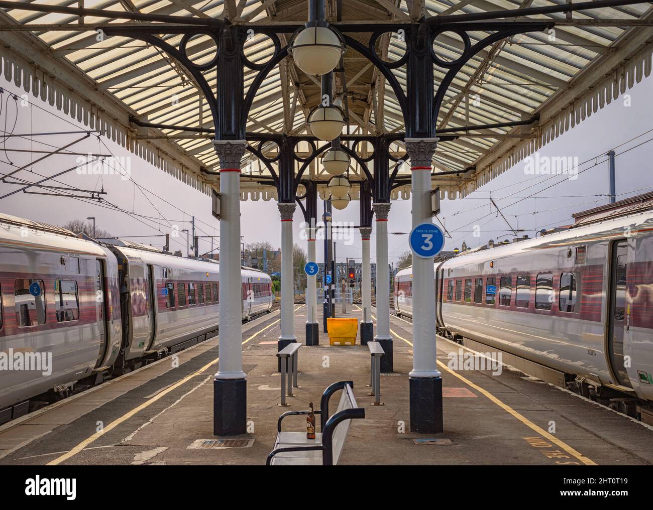 Train Columns A 19th Century railway station canopy with a modern trains either side ...