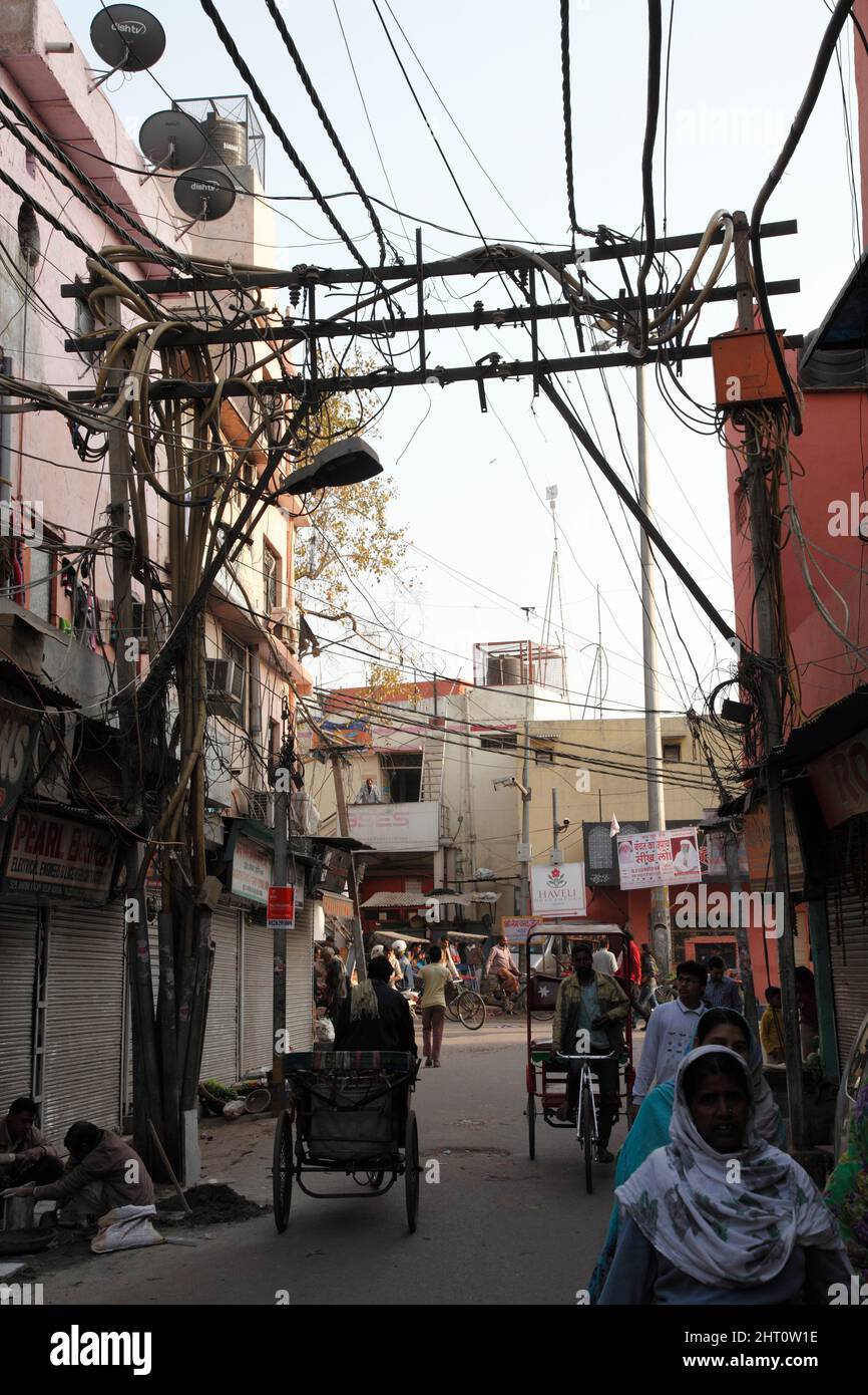 Electricity power lines in streets of Old Delhi, Delhi, India Stock