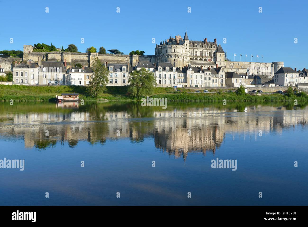 Magnificent castle very famous with its reflections on river Loire at Amboise, a commune in the Indre-et-Loire department in central France. Stock Photo