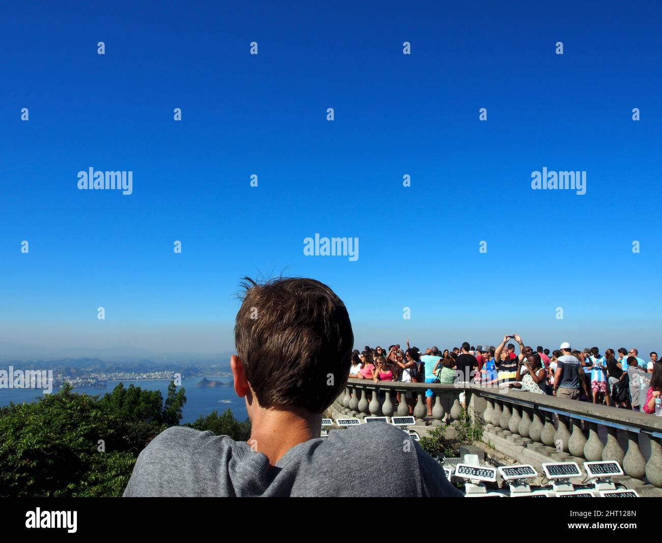 Traveler man staring at view of Rio de Janeiro Stock Photo
