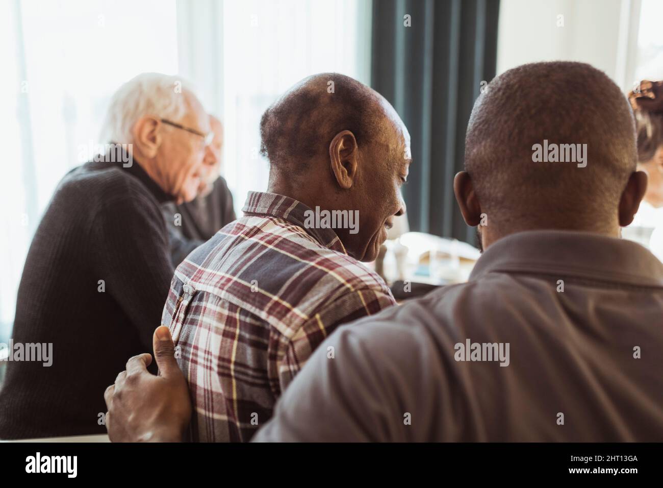 Care worker african white hi-res stock photography and images - Alamy