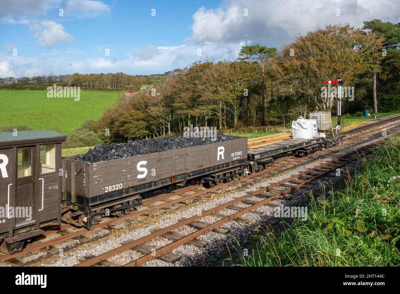 WOODY BAY, DEVON, UK - OCTOBER 19 : Coal wagon on the Lynton and Barnstaple Steam Railway line at Woody Bay Station in Devon on October 19, 2013 Stock Photo