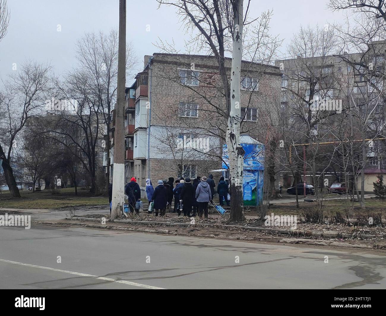 Donetsk. 26th Feb, 2022. People wait to buy water in Donetsk, Feb. 26, 2022. Credit: Xinhua/Alamy Live News Stock Photo