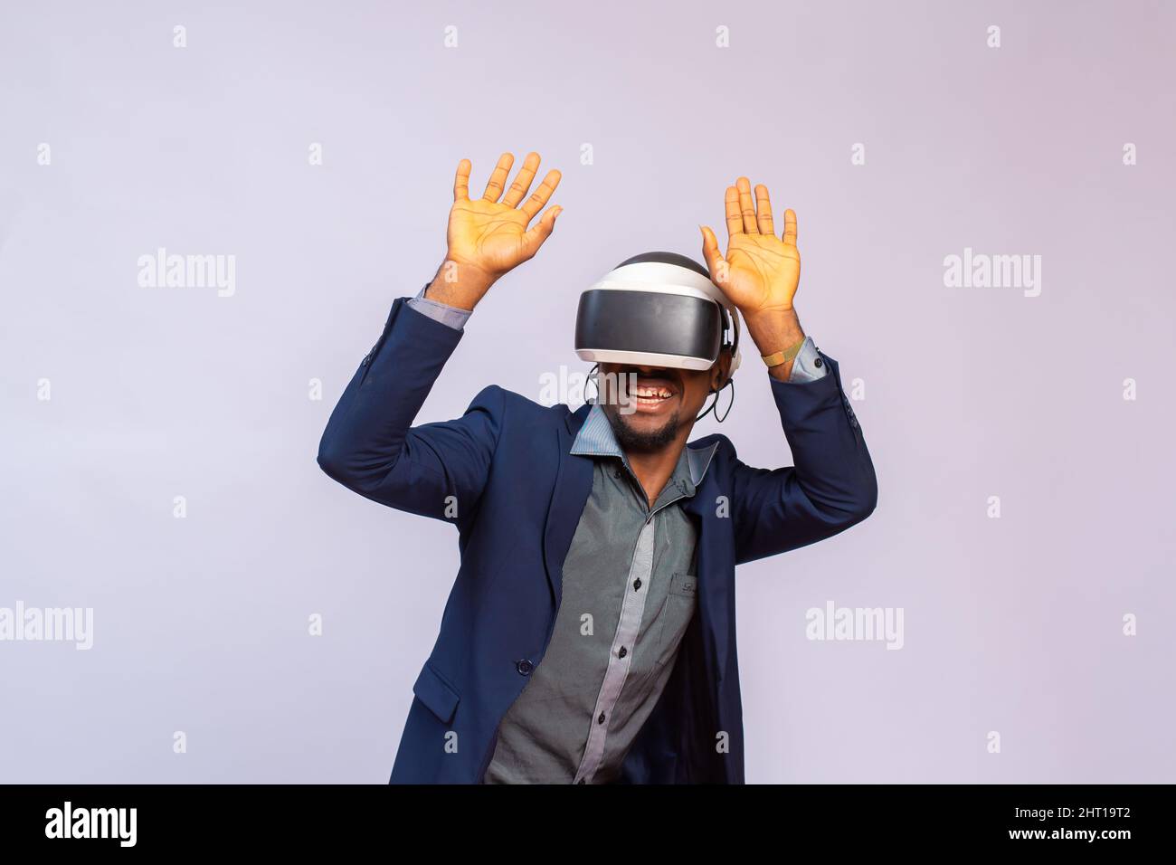 African businessman wearing a virtual reality glasses isolated on a ...