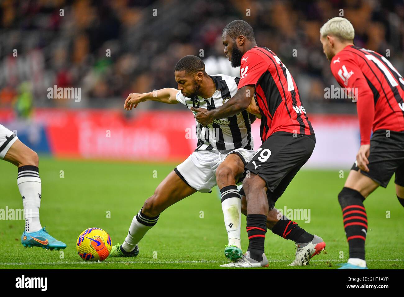 Milano, Italy. 25th Feb, 2022. Beto (9) of Udinese and Franck Kessie (79) of Milan seen in the Serie A match between AC Milan and Udinese at San Siro in Milano. (Photo Credit: Gonzales Photo/Alamy Live News Stock Photo