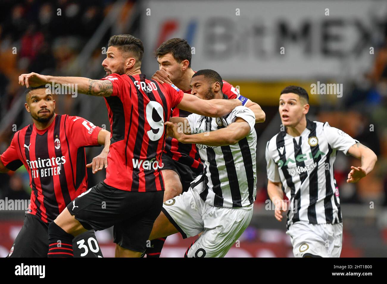 Milano, Italy. 25th Feb, 2022. Olivier Giroud (9) of AC Milan and Beto (9) of Udinese seen in the Serie A match between AC Milan and Udinese at San Siro in Milano. (Photo Credit: Gonzales Photo/Alamy Live News Stock Photo