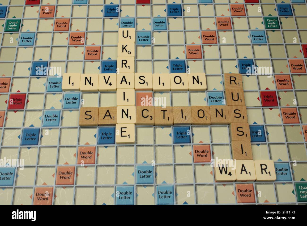 Ukraine invasion concept on a scrabble board, Stock Photo