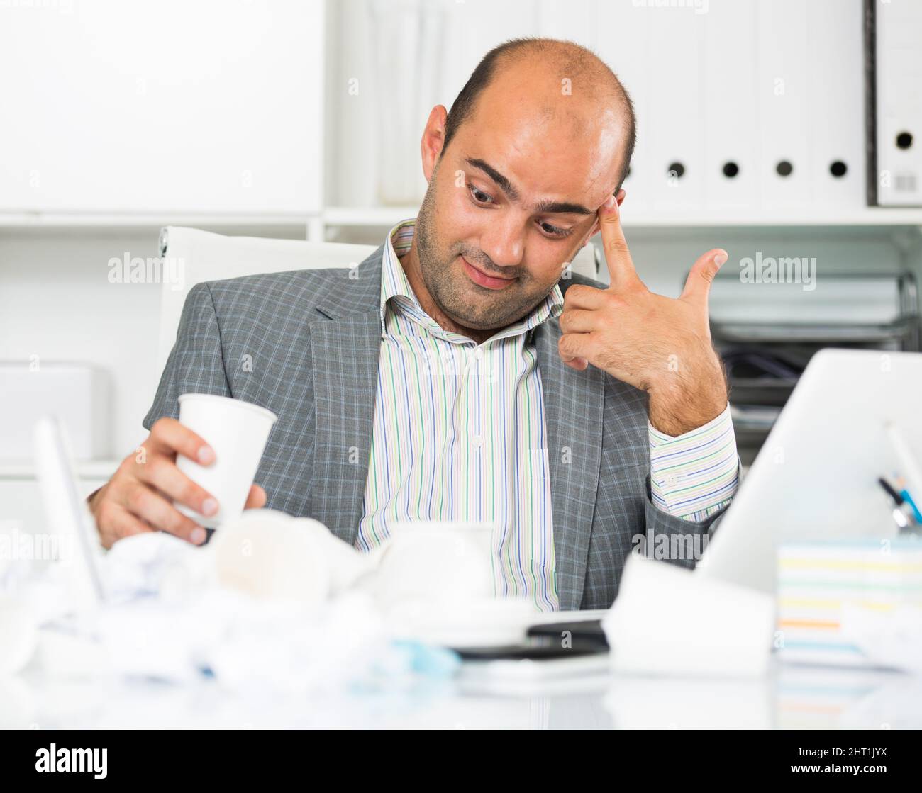 male having lot of work and problems Stock Photo