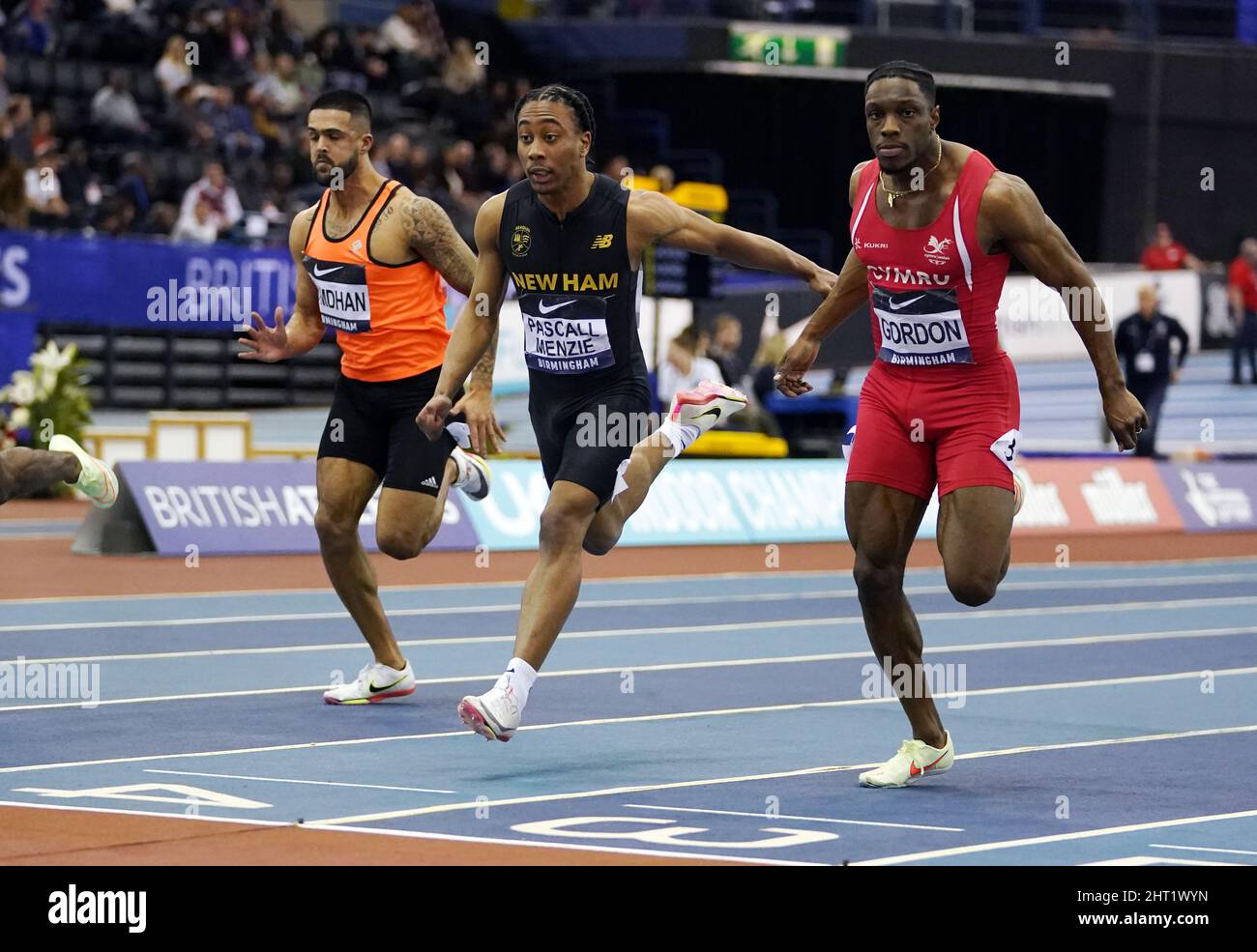 Joel Pascal Menzie (centre) wins the Men's 60m semi final during day one of the UK Athletics Indoor Championships at the Utilita Arena, Birmingham. Picture date: Saturday February 26, 2022. Stock Photo