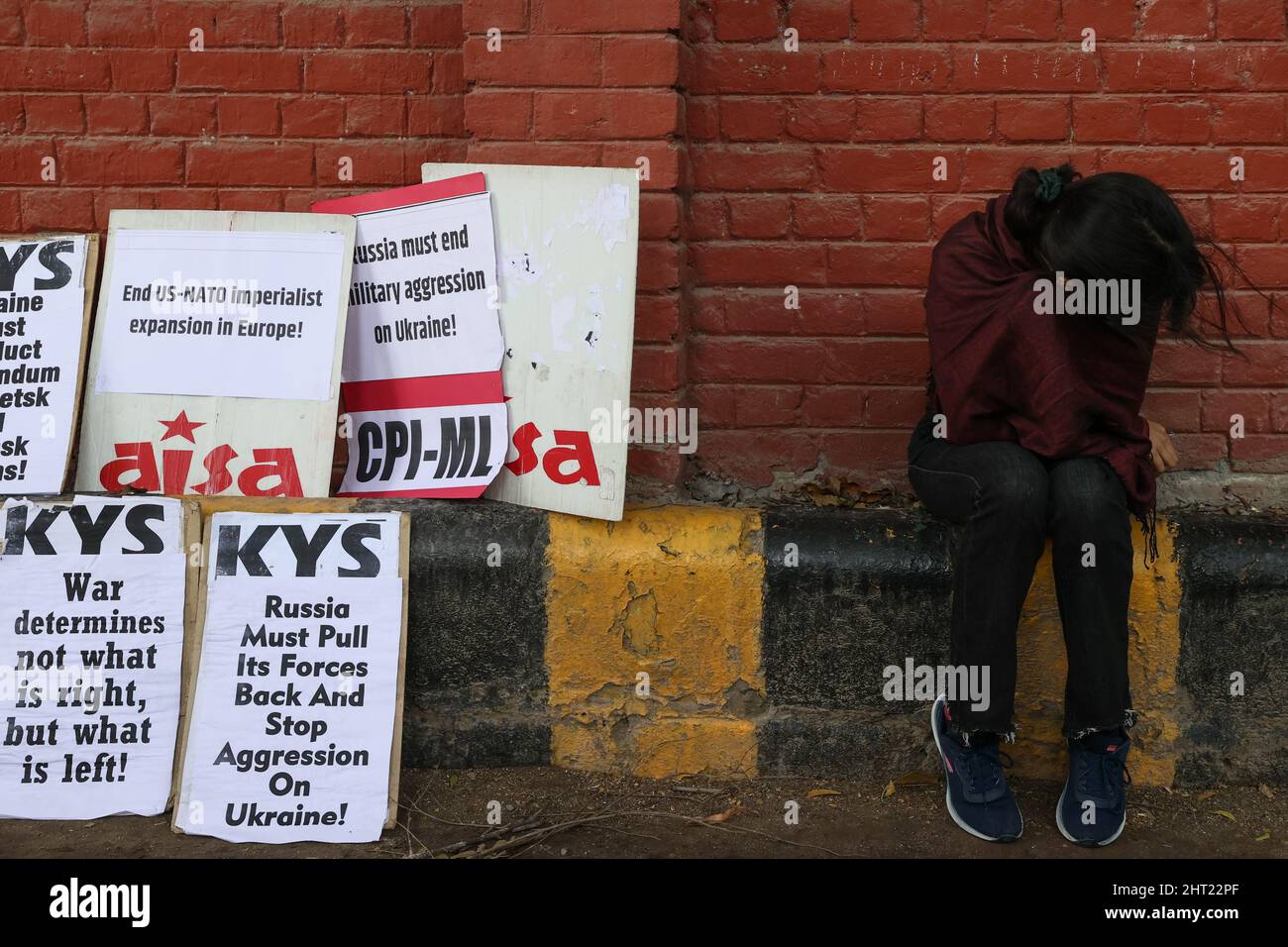 New Delhi, New Delhi, India. 26th Feb, 2022. A student activist rests during a protest against Russia's invasion of Ukraine. (Credit Image: © Karma Sonam Bhutia/ZUMA Press Wire) Stock Photo