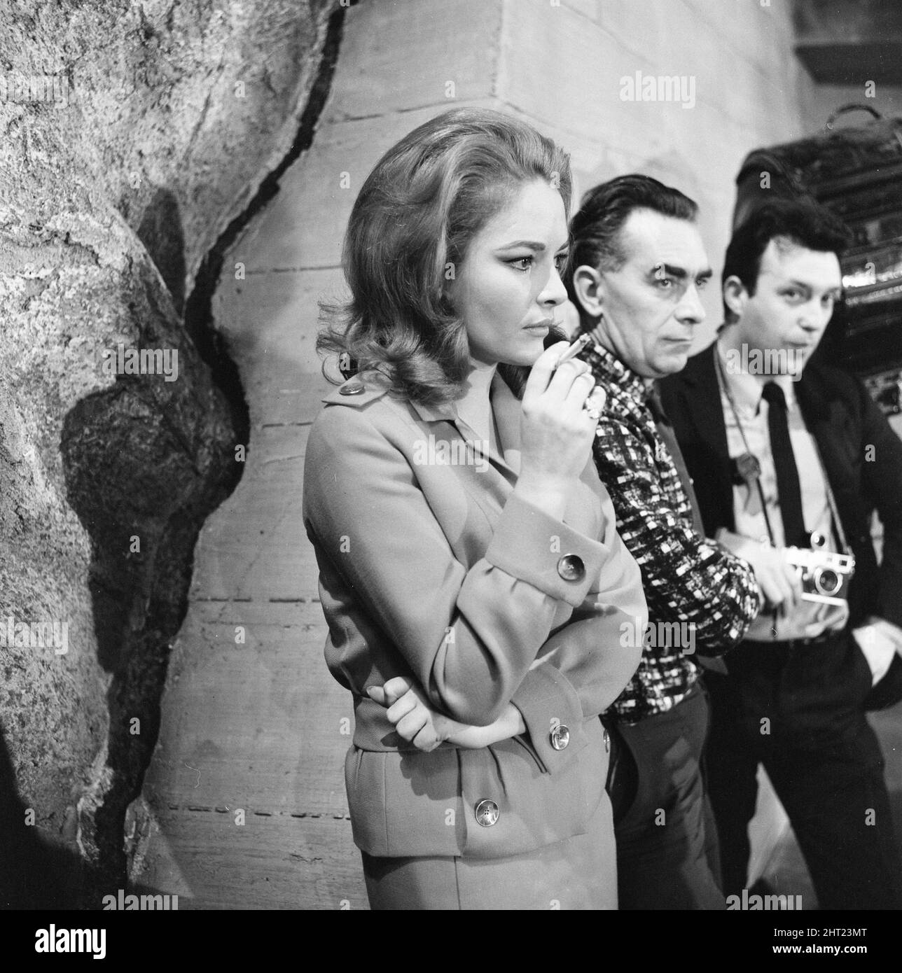 Karin Dor, German actress, on the set of new James Bond film, You Only Live Twice, she plays Spectre agent Helga Brandt, pictured at Pinewood Studios, Tuesday 6th December 1966. Our picture shows ... Karin watches as stunt girl Jenny Le Fre, completes her death scene, a fall as she walks across a narrow footbridge. Stock Photo