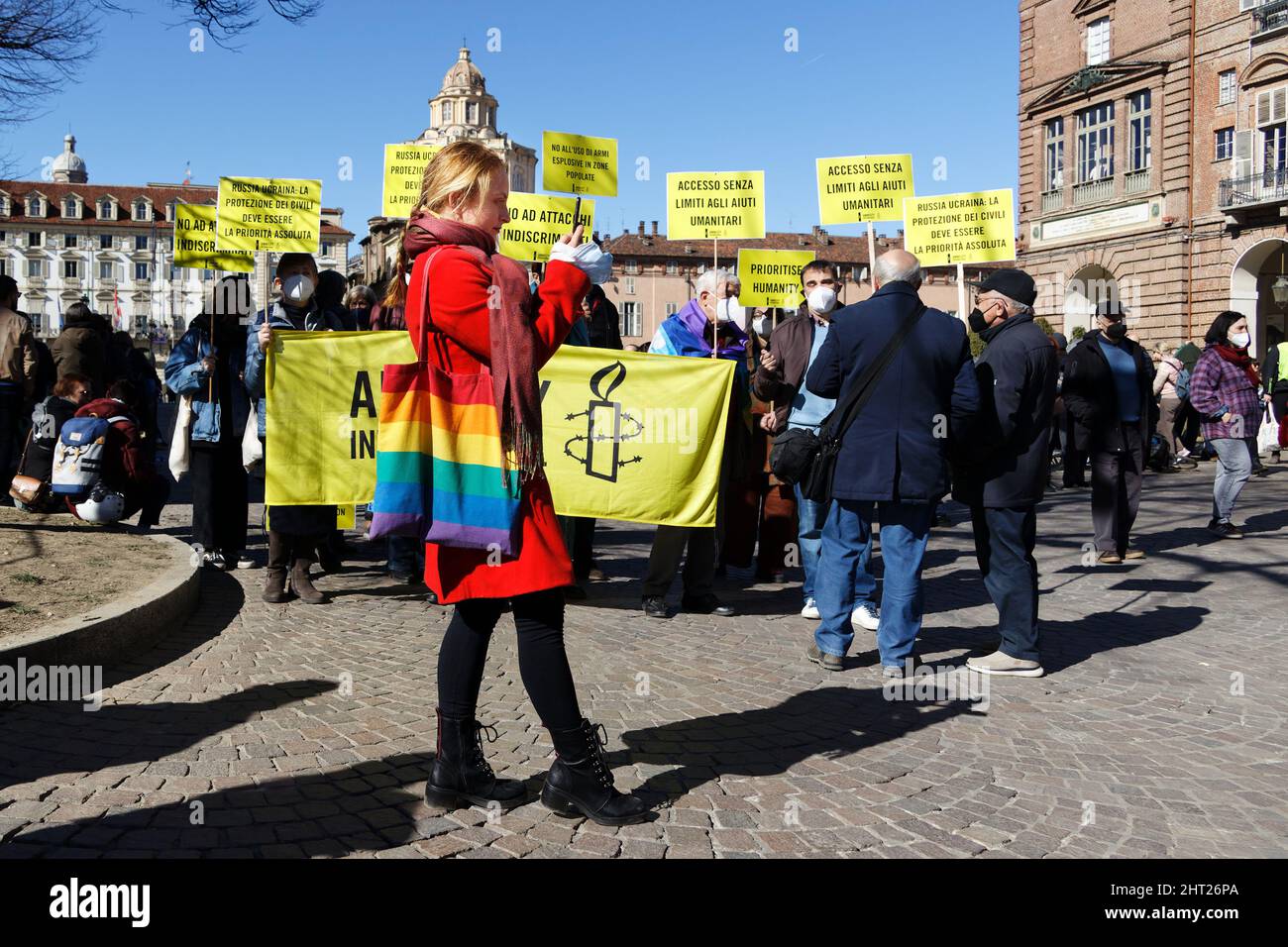 Turin, Italy. 26th Feb, 2022. Amnesty International activists protest against the Russian invasion of Ukraine. Credit: MLBARIONA/Alamy Live News Stock Photo