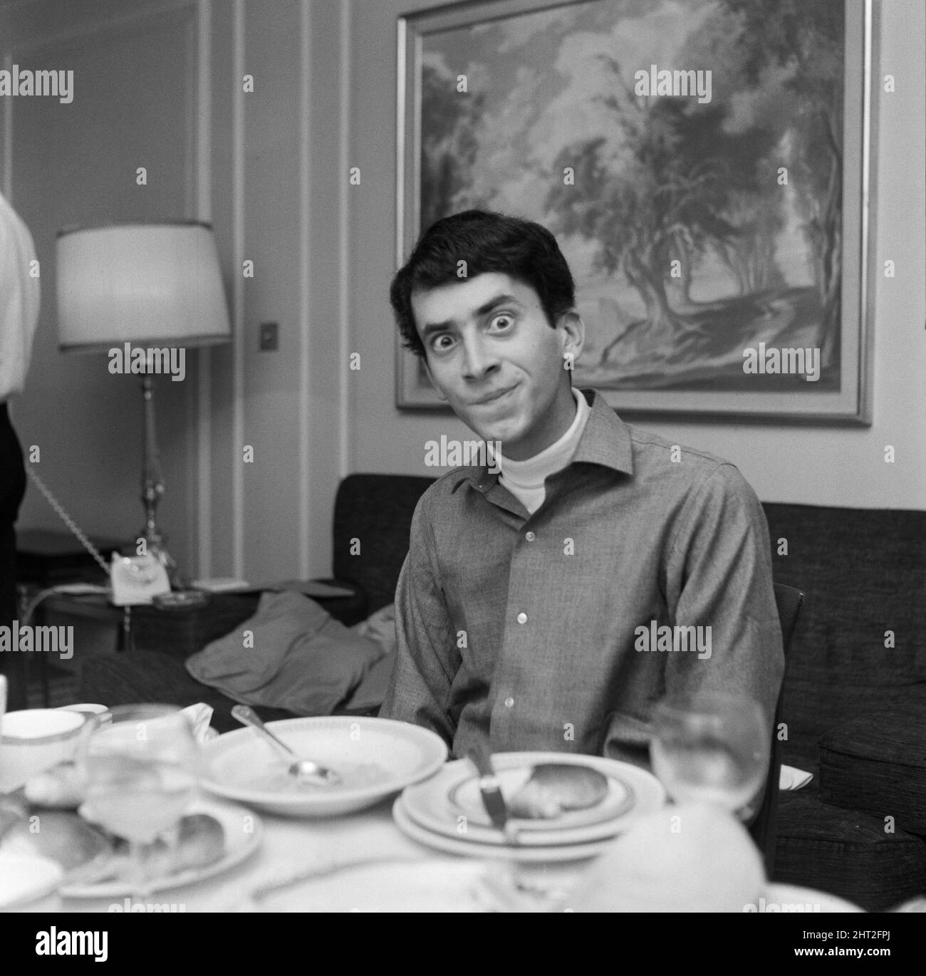 Gary Lewis, son of American film comedian Jerry Lewis pictured at breakfast in his London hotel before leaving for Amsterdam. Gary is the front man for Gary Lewis and The Playboys.  Gary Lewis and The Playboys were an American 1960s era pop and rock group. They are best known for their 1965 Billboard Hot 100 number-one single 'This Diamond Ring', which was the first of a string of hit singles they had in 1965 and 1966. The band had an earnest, boy-next-door image similar to British invasion contemporaries such as Herman's Hermits and Gerry and the Pacemakers.   Picture taken 24th September 196 Stock Photo