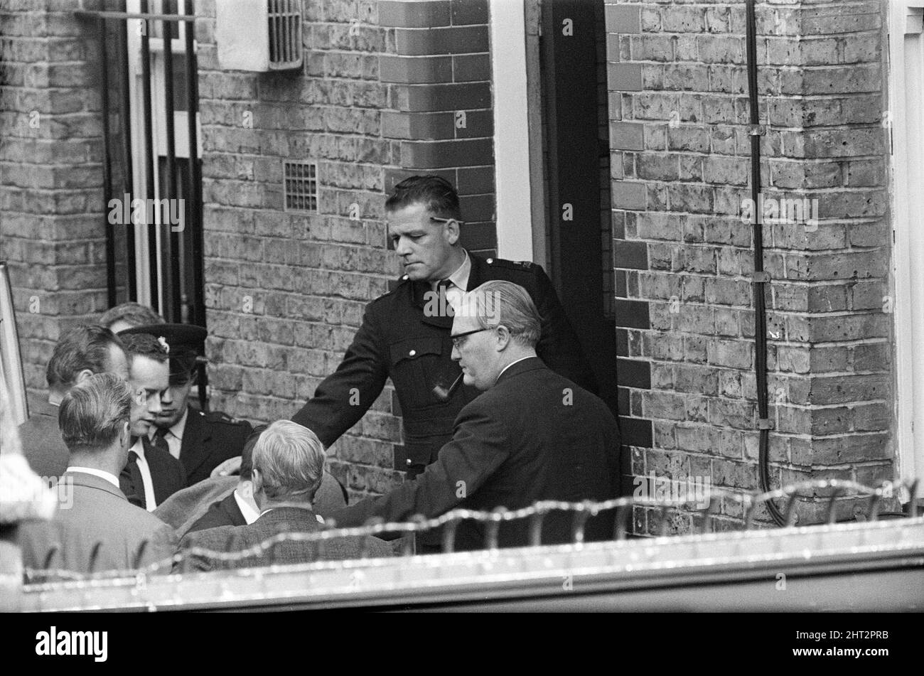 John Edward Witney, 36, who has been charged with the murder of 3 police officers, was taken from Shepherds Bush police station (the murder HQ) and driven to West London Magistrate Court, where he made a brief appearance and was remanded in custody until August 23.  16th August 1966. Stock Photo