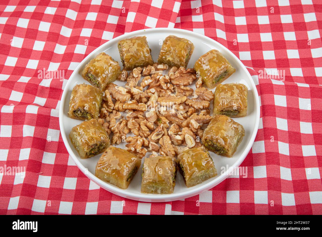 Traditional Turkish dessert walnut baklava with walnuts and tea on a