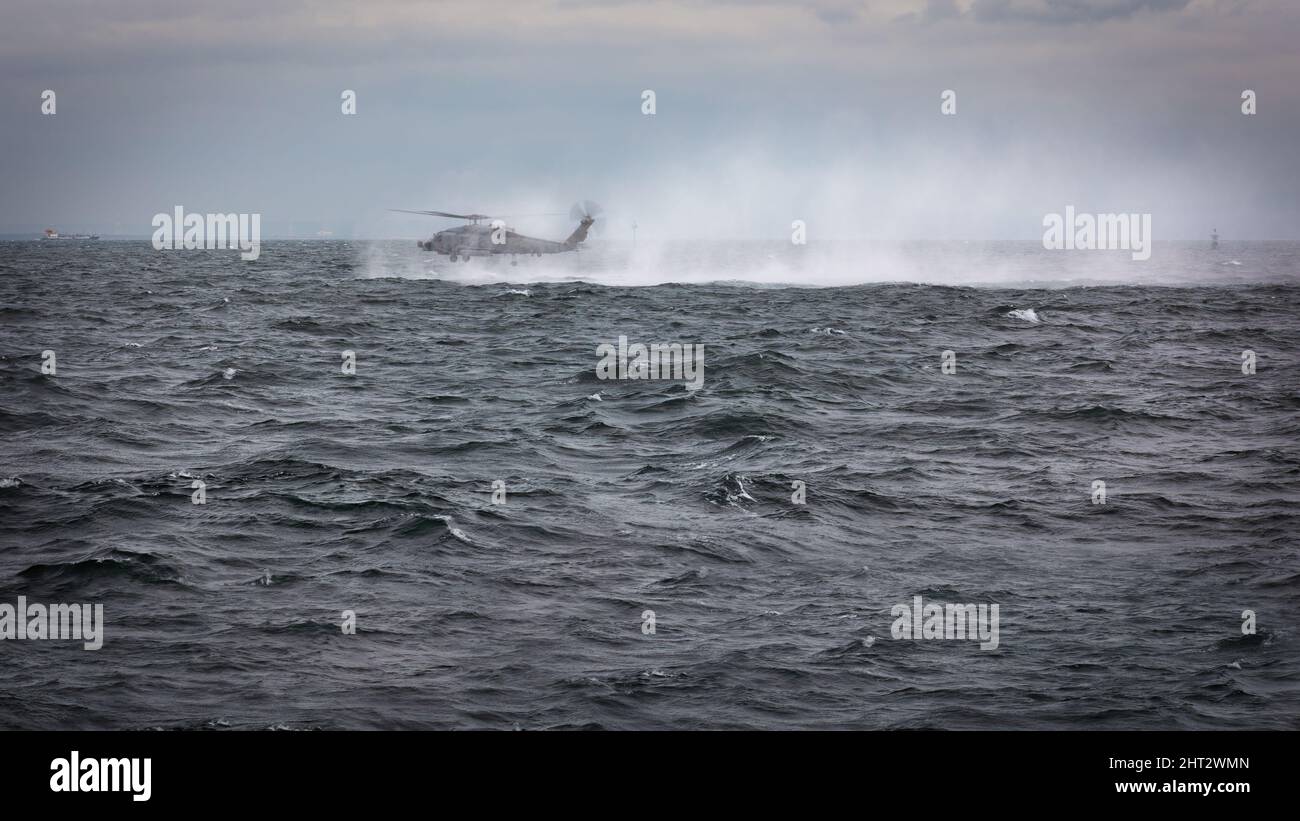 Us navy helicopter flying hi-res stock photography and images - Alamy