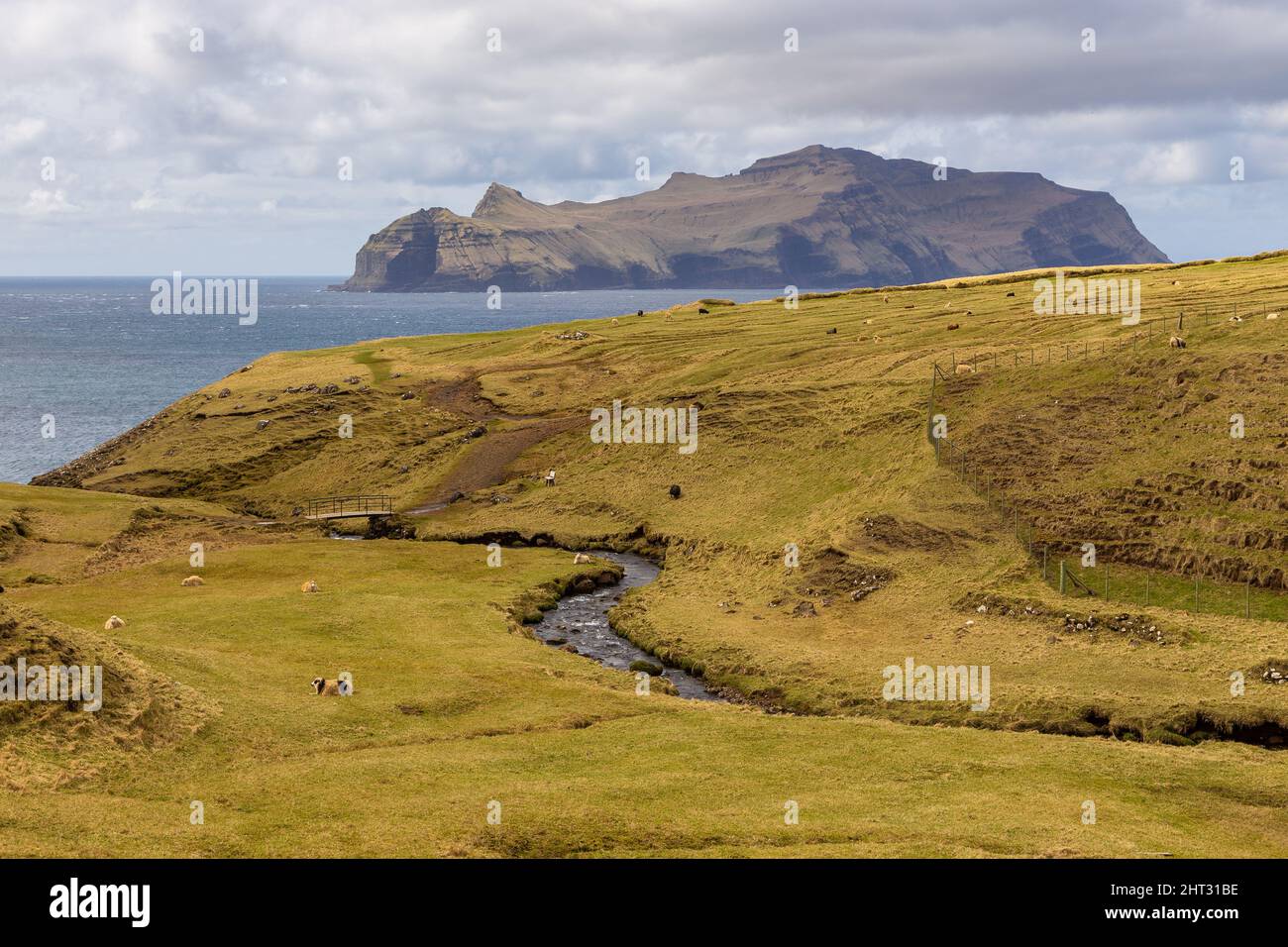Mountain landscape on the island of Vagar. Cloudy spring day. Faroe ...