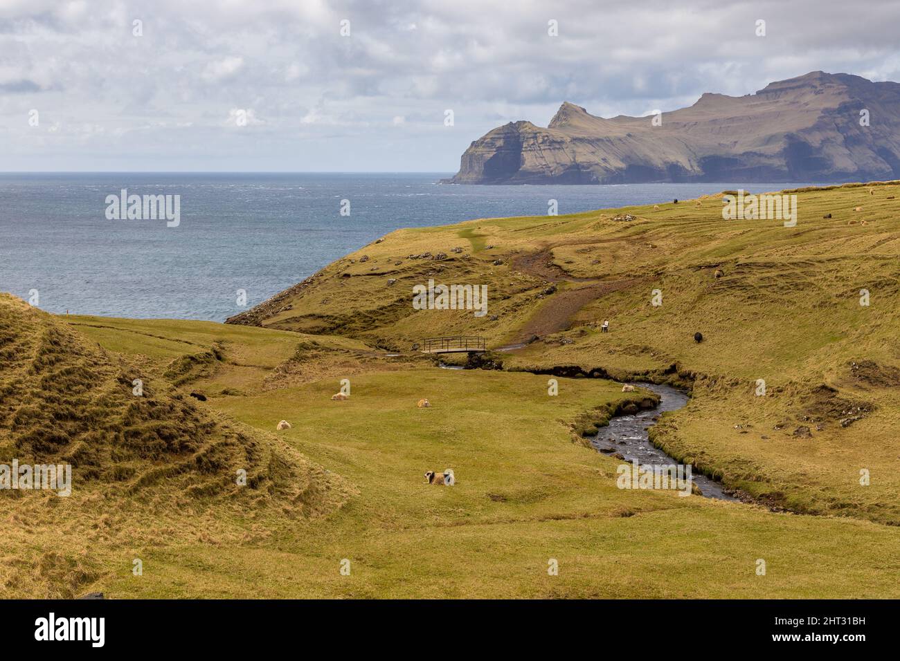 Mountain landscape on the island of Vagar. Cloudy spring day. Faroe ...
