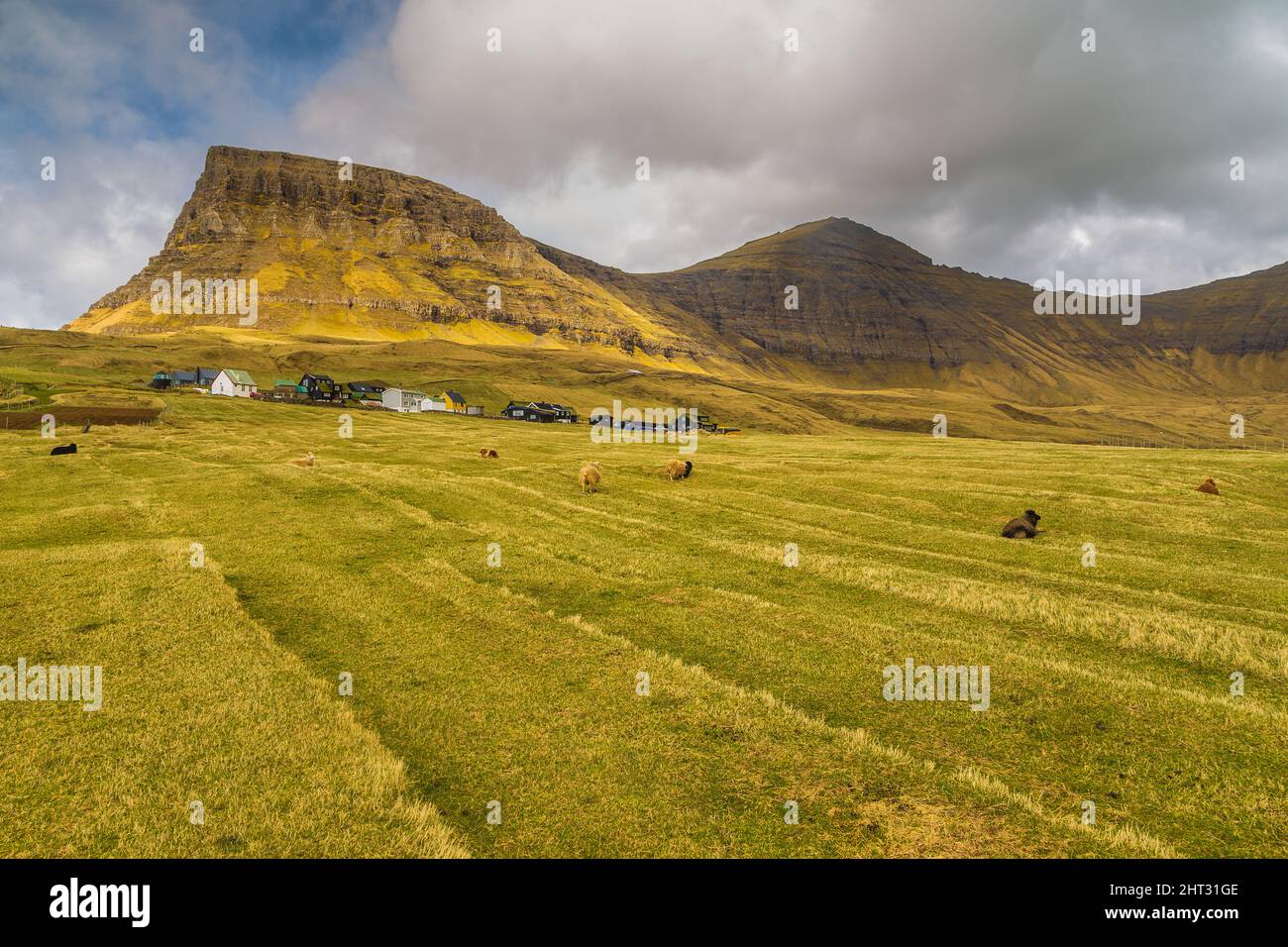 Mountain landscape on the island of Vagar. Cloudy spring day. Faroe ...