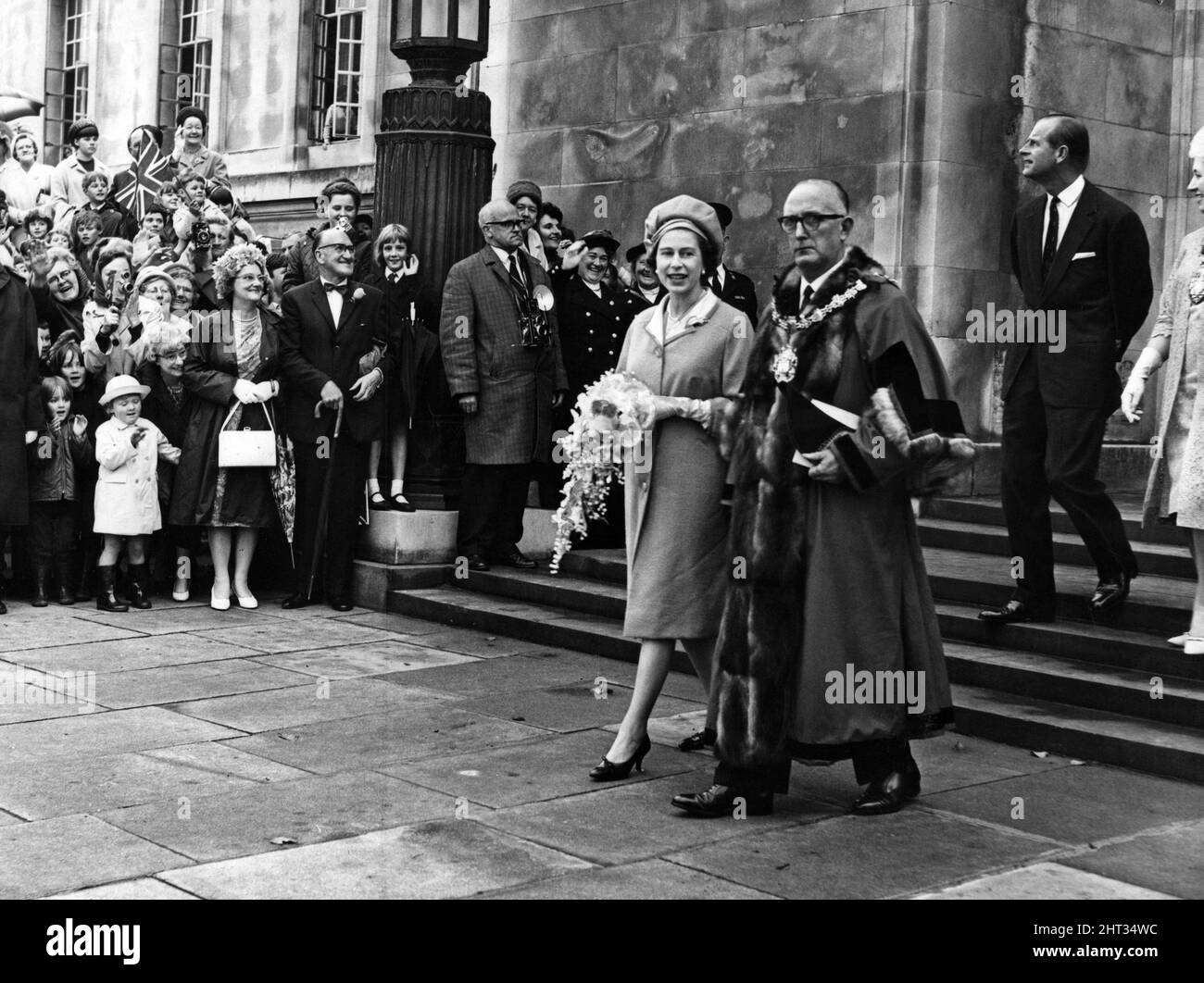 Queen Elizabeth II leaves the Guildhall, Swansea, with Mayor Alderman F.C Jones.  26th June 1965. Stock Photo