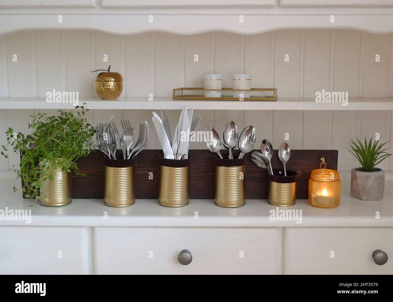 DiyCutlery holders in gold Stock Photo Alamy