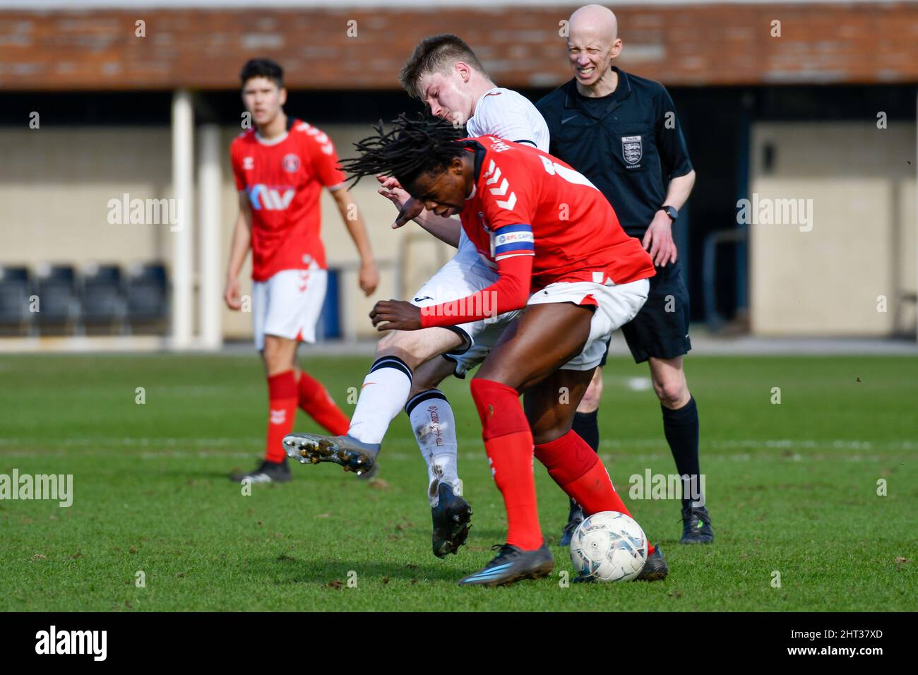 Swansea, Wales. 26 February, 2022. Josh Edwards of Swansea City Under 18s battles with Karoy Anderson of Charlton Athletic Under 18s during the Professional Development League game between Swansea City Under 18s and Charlton Athletic Under 18s at the Swansea City Academy in Swansea, Wales, UK on 26, February 2022. Credit: Duncan Thomas/Majestic Media. Stock Photo