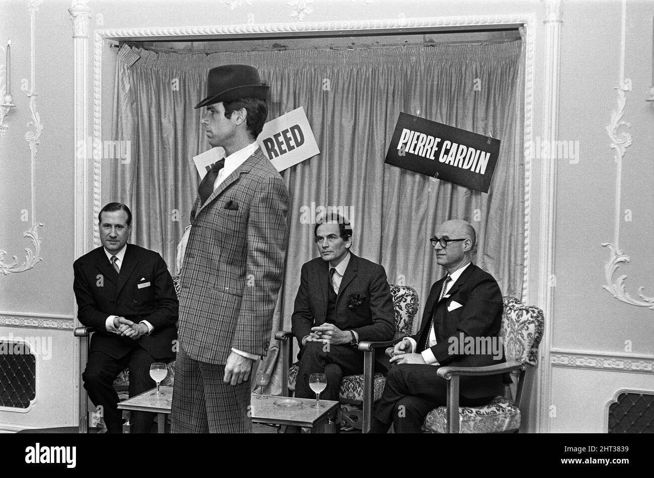 Pierre Cardin men's fashion. Pierre Cardin pictured seated second from ...