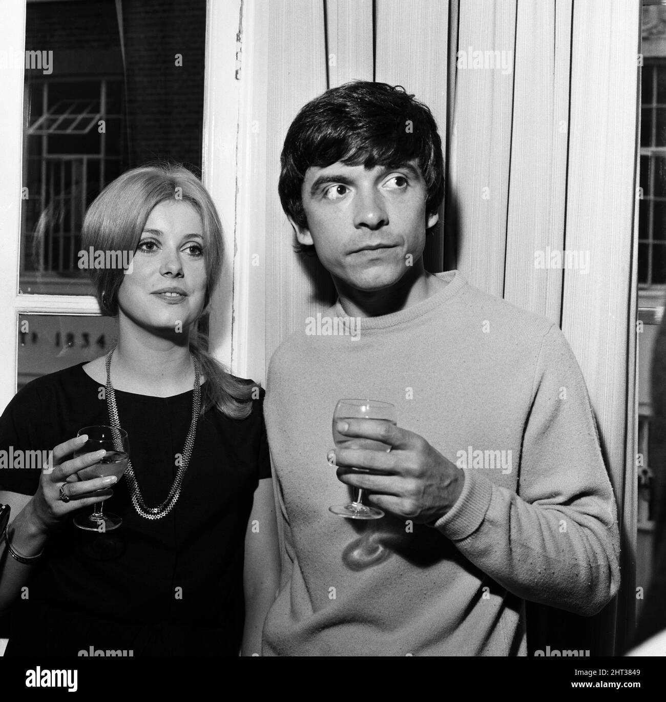 Photographer David Bailey, 27 years old, marries French actress Catherine Deneuve, aged 21 years, at St Pancras Registry Office. The couple only met each other 11 weeks before when David was taking photographs in Paris. David Bailey and Catherine Deneuve pictured at the reception after the ceremony. 18th August 1965. Stock Photo