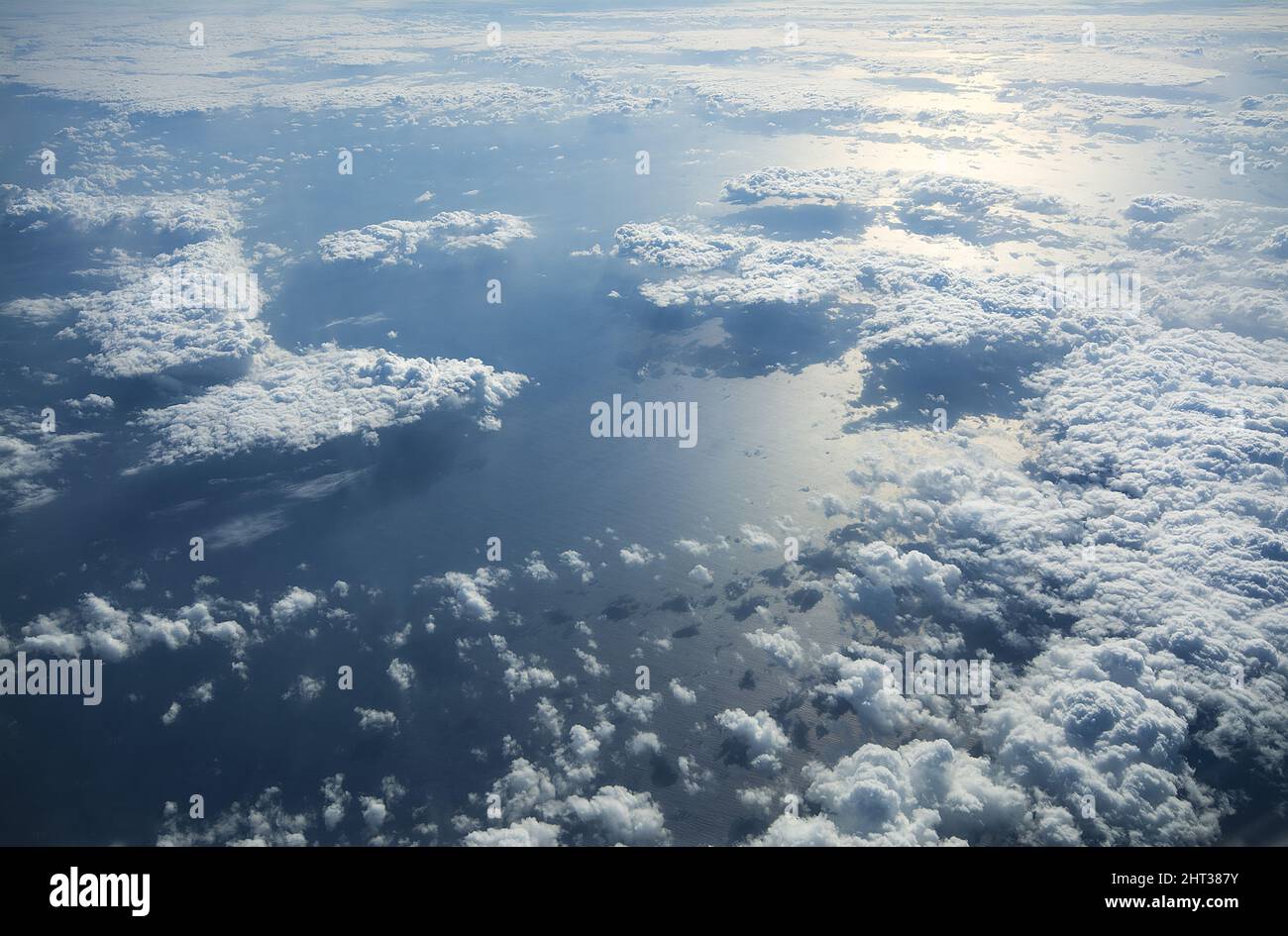 Aerial shot of the sea covered with white clouds Stock Photo - Alamy
