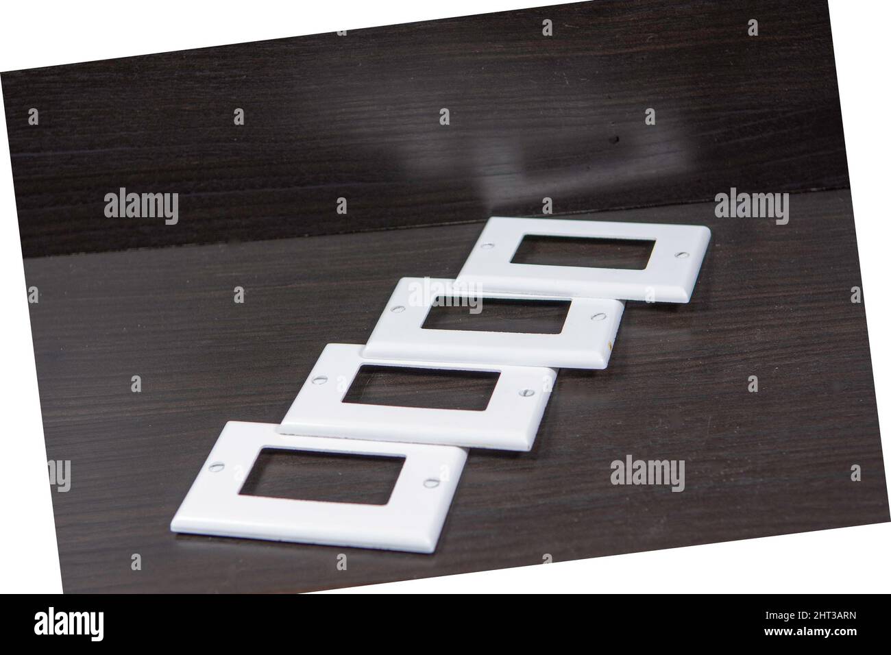 White plastic covers for electrical and switches and sockets lined up