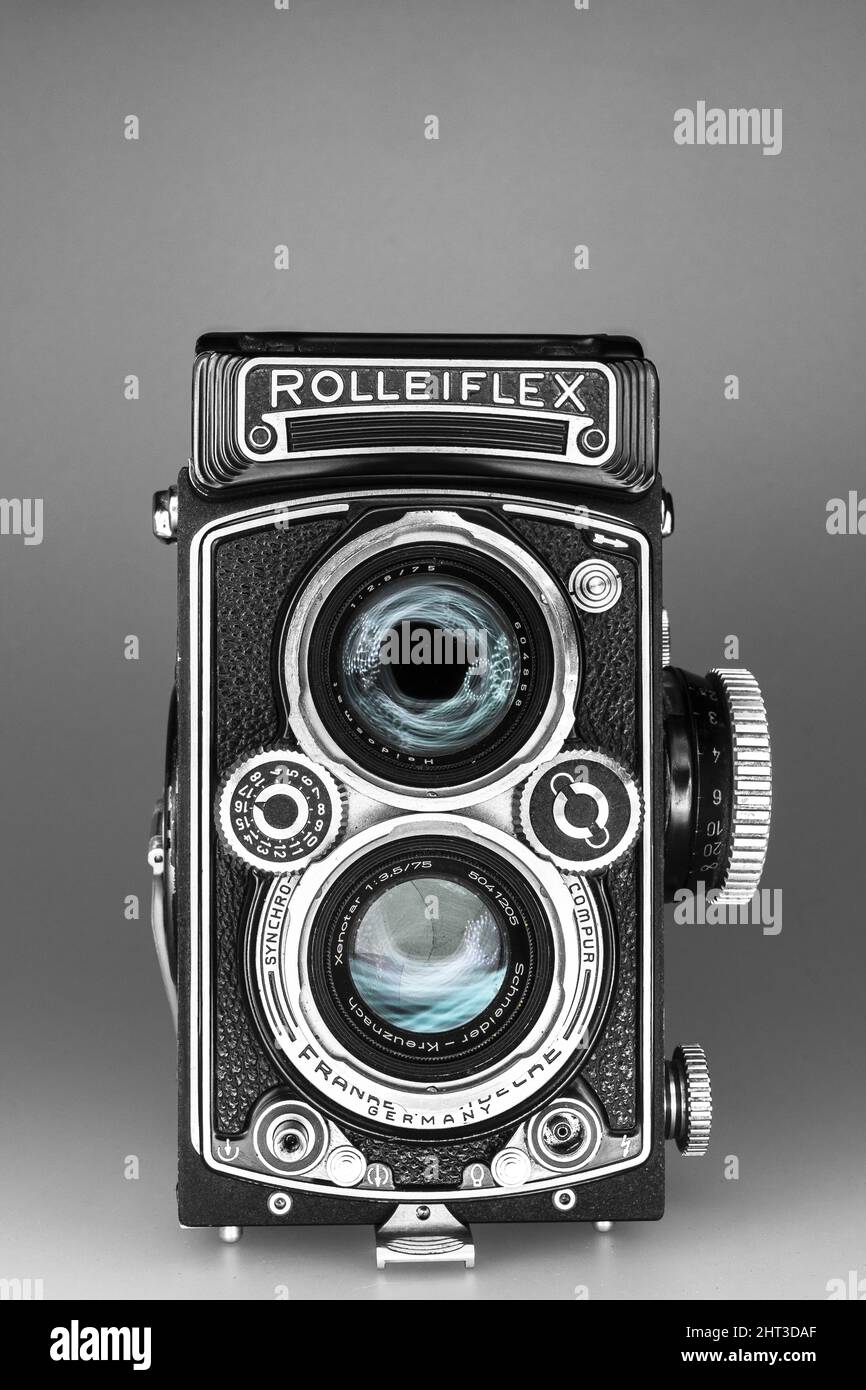Vertical shot of a vintage Rolleiflex camera with dual-lens Stock Photo