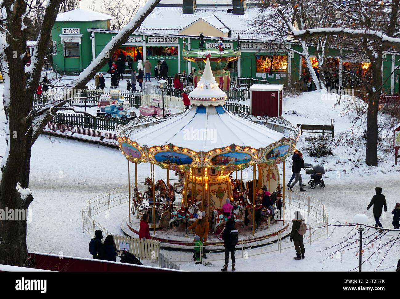 Children's carousel in Christmas market Stock Photo