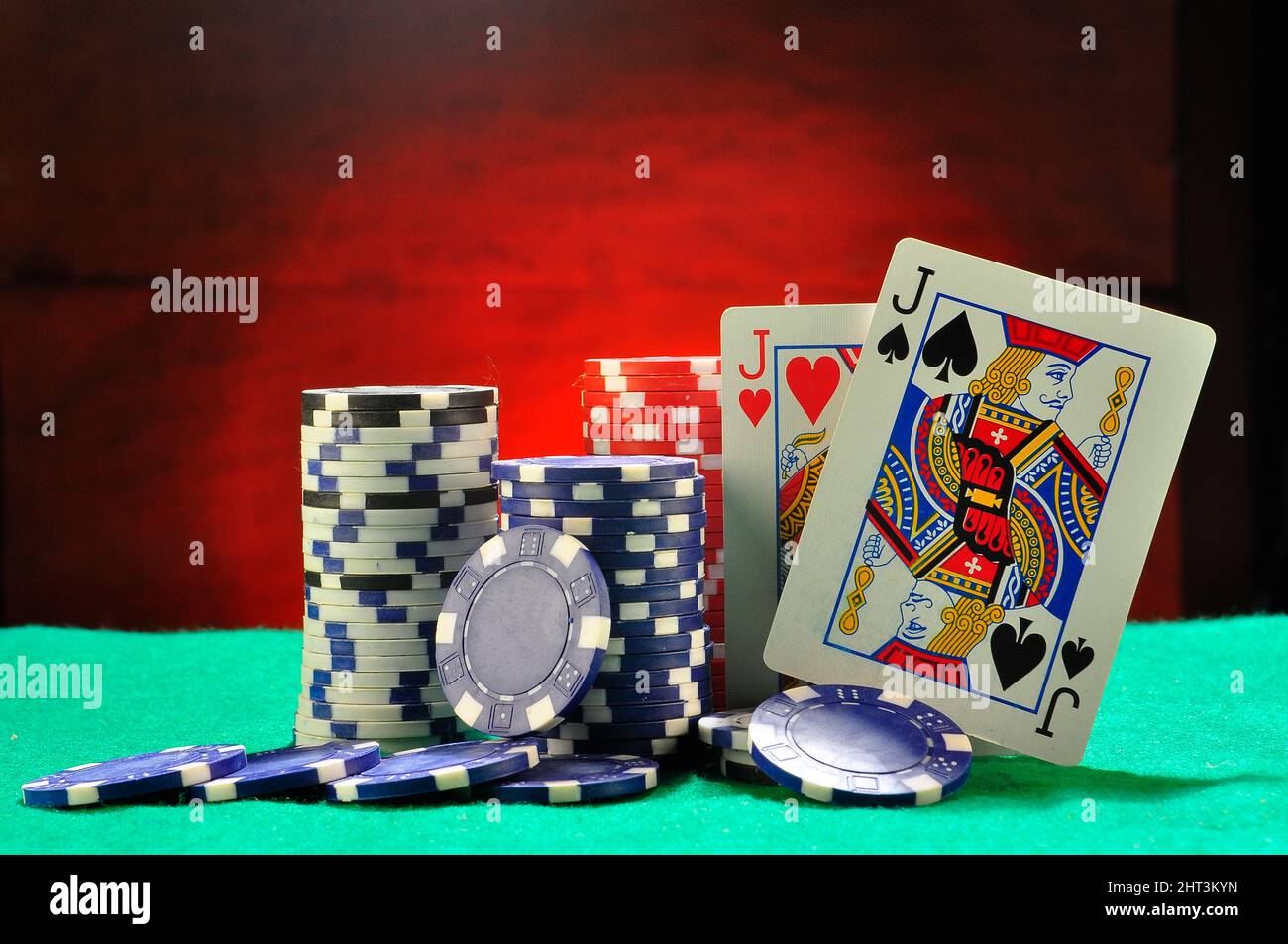 Casino table, chips and cards on studio shot Stock Photo Alamy