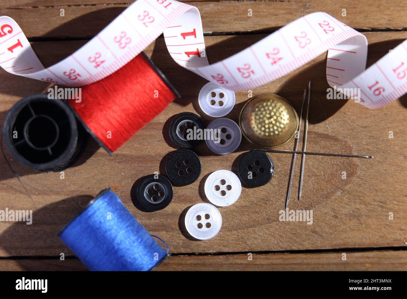 needle and thread sewing tailor Stock Photo