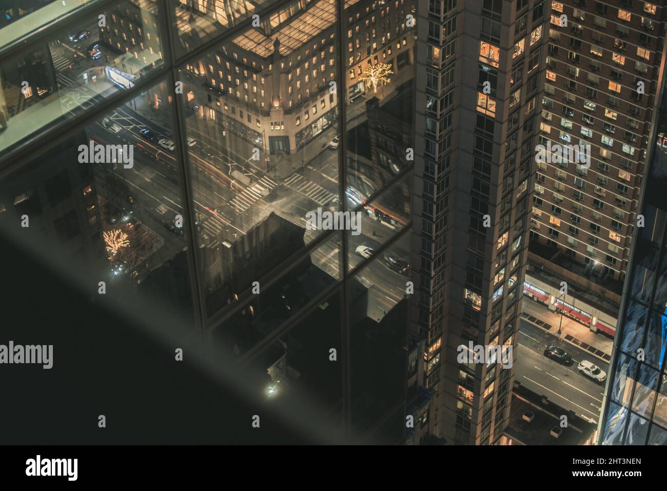 View of the downtown from a modern skyscraper at night in New York City ...