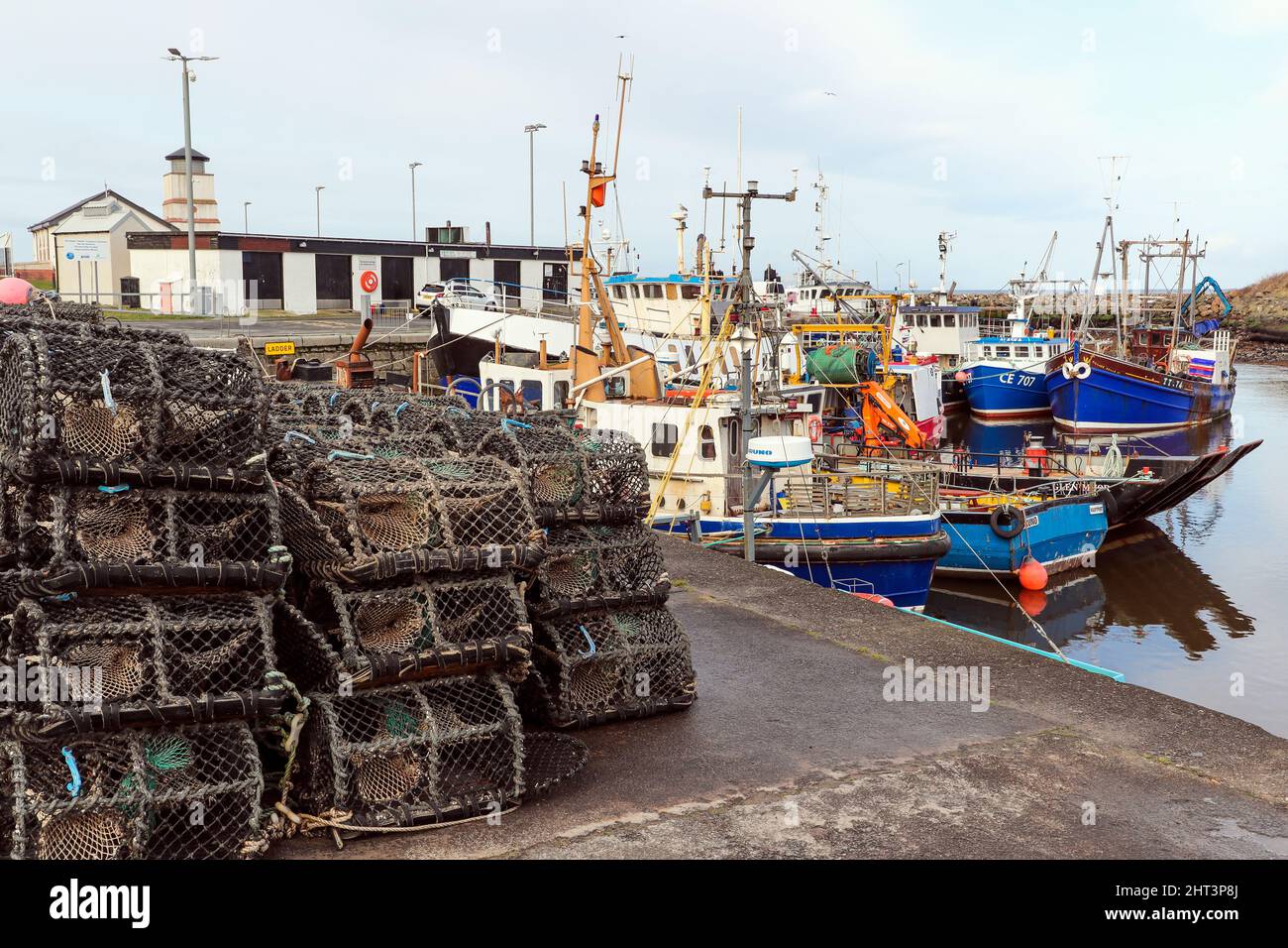 Fishing boats berthed at Girvan harbour, Ayrshire on the Firth of Clyde coast, Scotland, UK Stock Photo