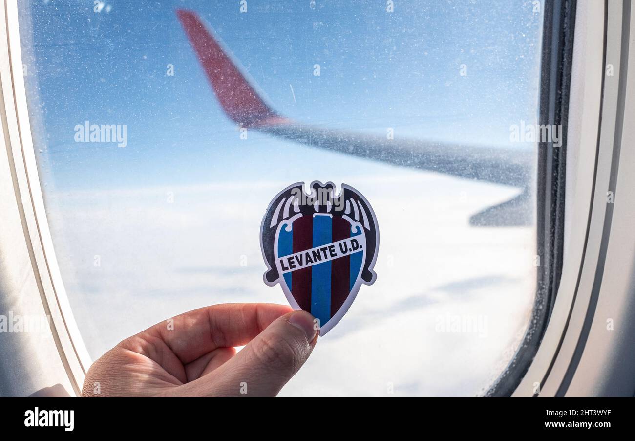 December 6, 2021. Levante, Spain. The logo of the Levante UD football club on the background of the airplane window. Stock Photo
