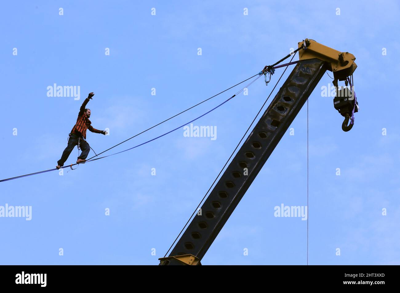 Alexandar Helmut Shulz showing his skill during the highline and trickline  performance at the Walk of Courage event. The 75th Years of Indian  Independence is celebrated at Azadi ka Amrit Mahotsav near