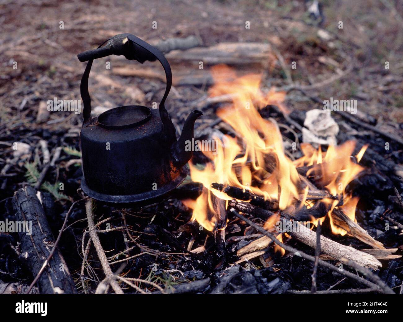 Morning coffee around a fire pit Stock Photo - Alamy