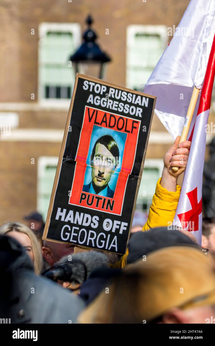 Westminster, London, UK. 26th Feb, 2022. As Russian President Vladimir Putin's military continues to attack Ukraine, Ukrainian nationals in the UK gather to ask the British Prime Minister to demand the World to do more to help remove the Russian invaders from their home country. Credit: Newspics UK South/Alamy Live News Stock Photo